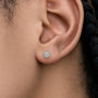 Close-up view of woman wearing 1ct Cushion-Cut Lab Grown Diamond Halo Stud Earrings