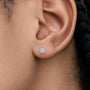 Close-up view of woman wearing 1.5ct Cushion-Cut Lab Grown Diamond Halo Stud Earrings