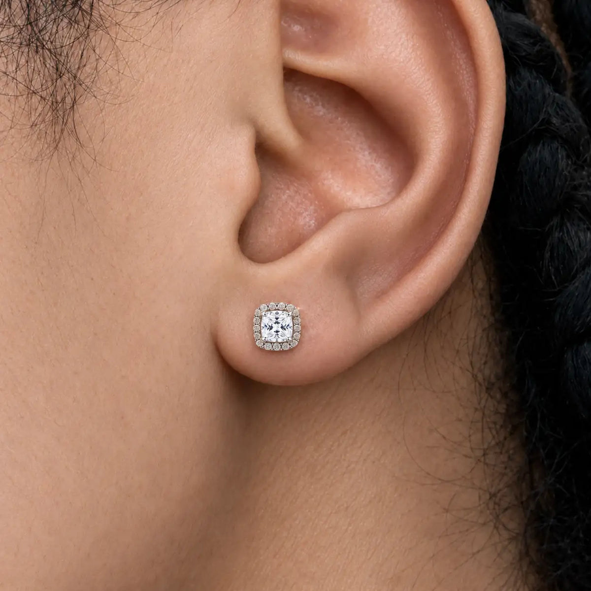 Close-up of model wearing 2ct Cushion-Cut Lab Grown Diamond Halo Earrings
