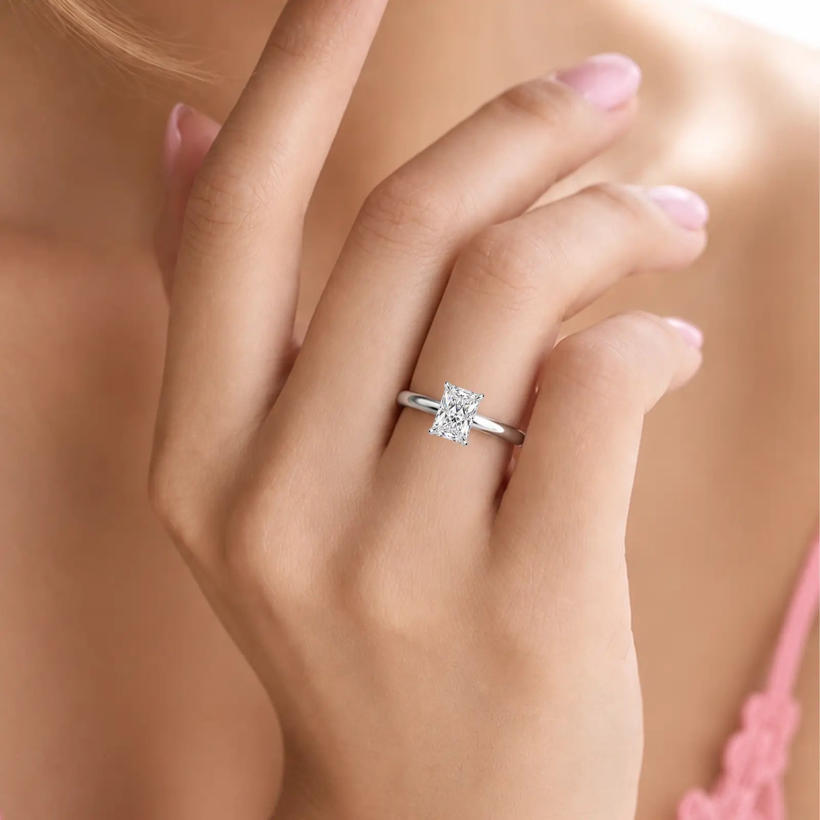 Woman wearing 3 Ct Emerald Cut Solitaire Diamond Ring by Fortune Jewellery