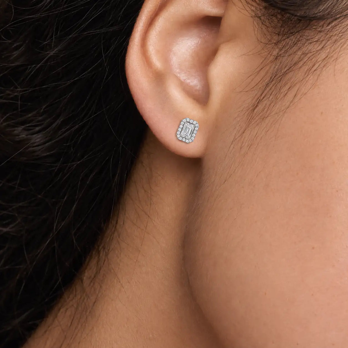 Woman styling 6ct Emerald-Cut Statement Halo Diamond Stud Earrings by Fortune Jewellery