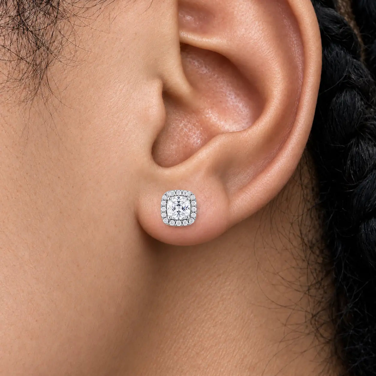 Close-up of woman wearing 6ct Cushion-Cut Lab Grown Diamond Halo Earrings
