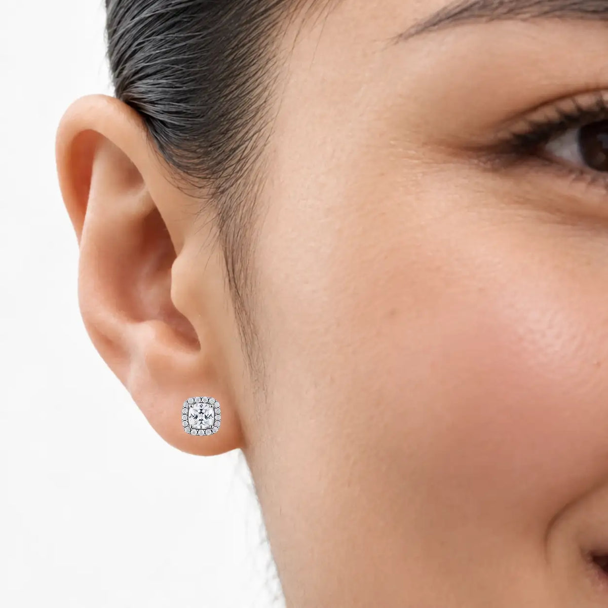 Model styling 10ct Cushion-Cut Lab Grown Diamond Halo Earrings for a glamorous partywear look
