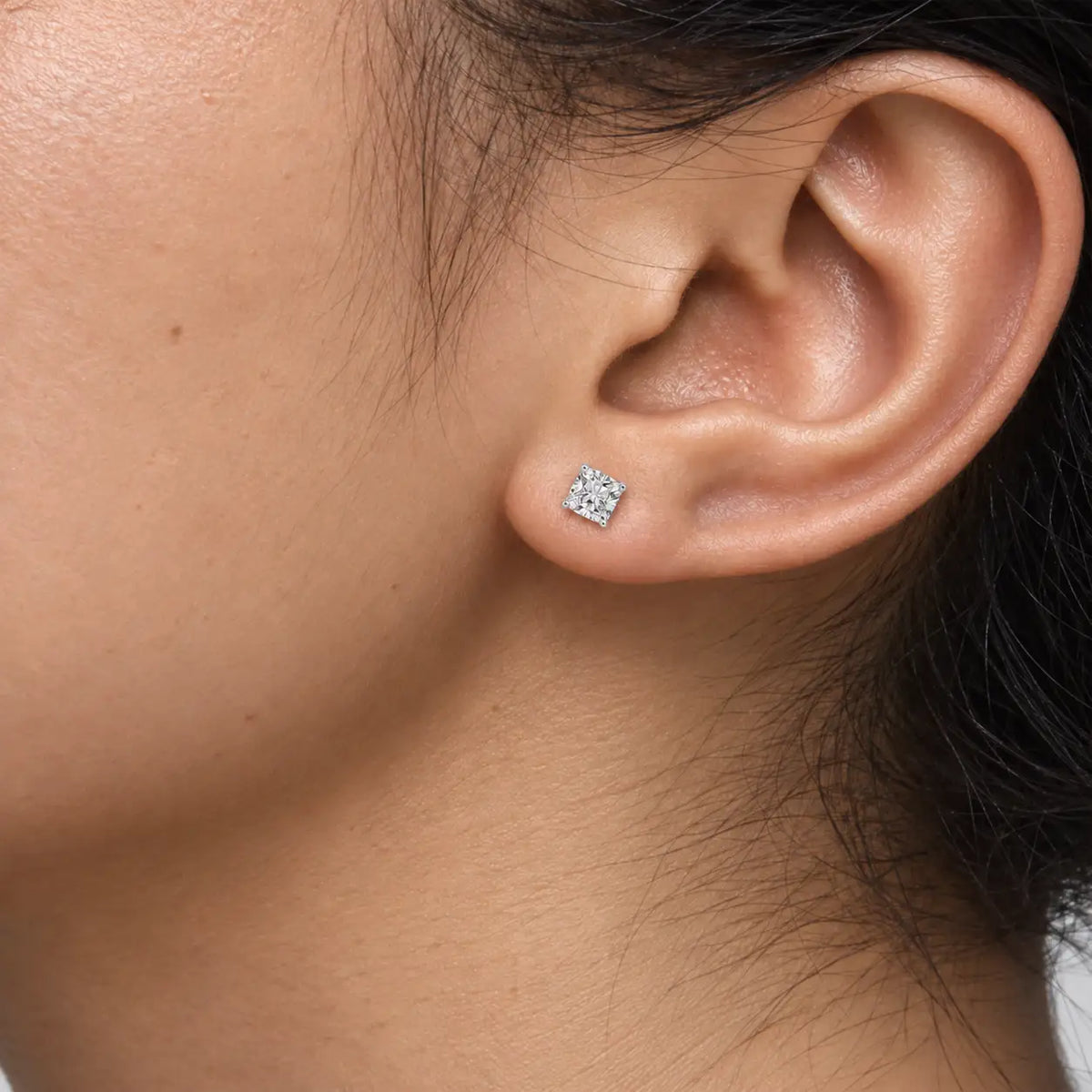 Close-up of model wearing 4ct Cushion-Cut Lab Diamond Solitaire Stud Earrings by Fortune Jewellery