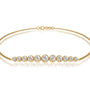 Unique yellow gold graduated bezel set diamond station bracelet 