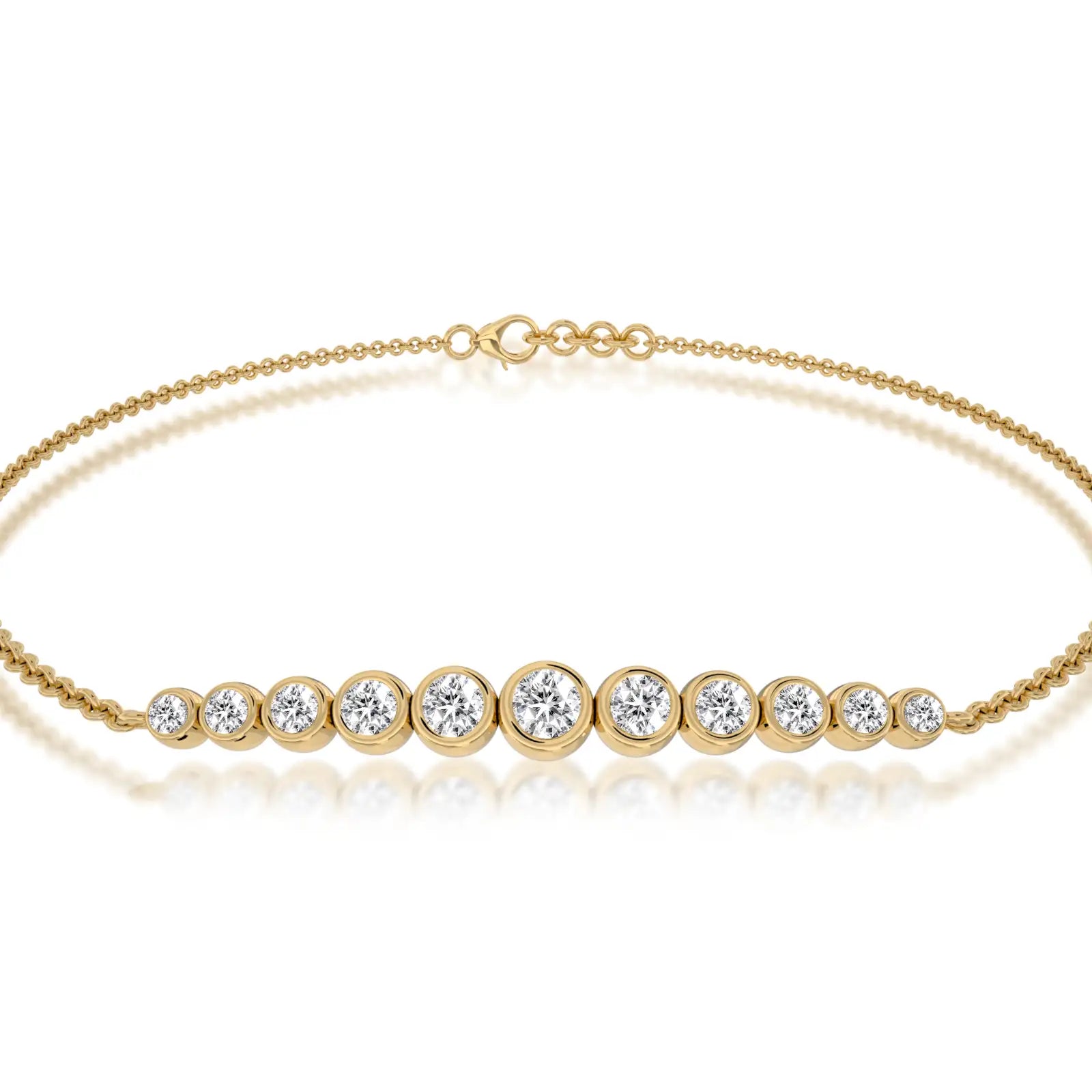 Unique yellow gold graduated bezel set diamond station bracelet 