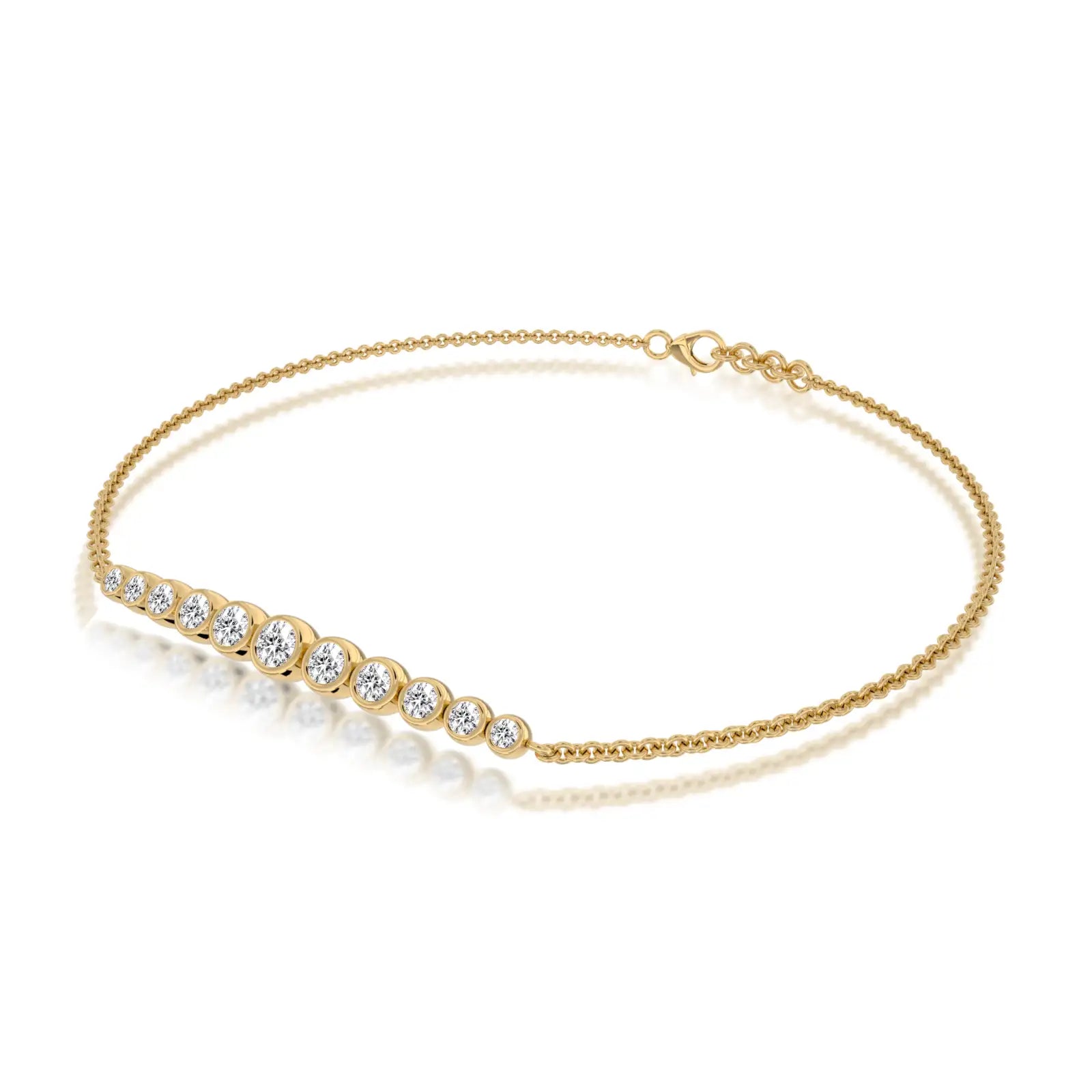 Trendy yellow gold graduated bezel set diamond station bracelet 