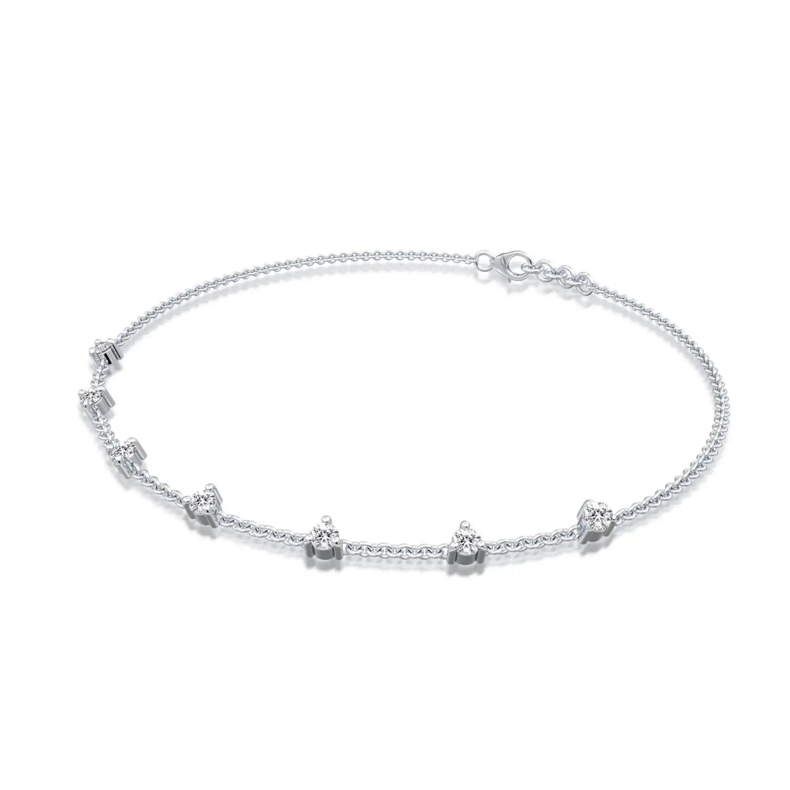 White gold prong set diamond station bracelet