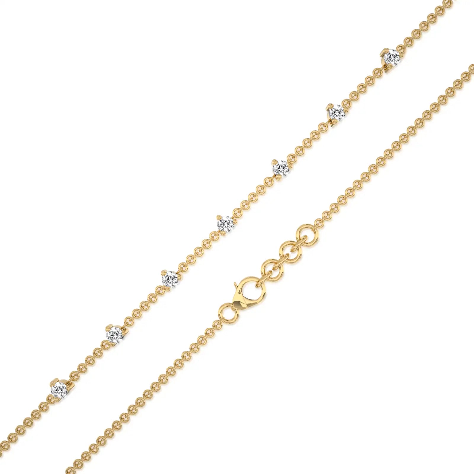 Fancy yellow gold prong set diamond station bracelet