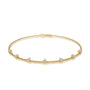 Yellow gold prong set diamond station bracelet