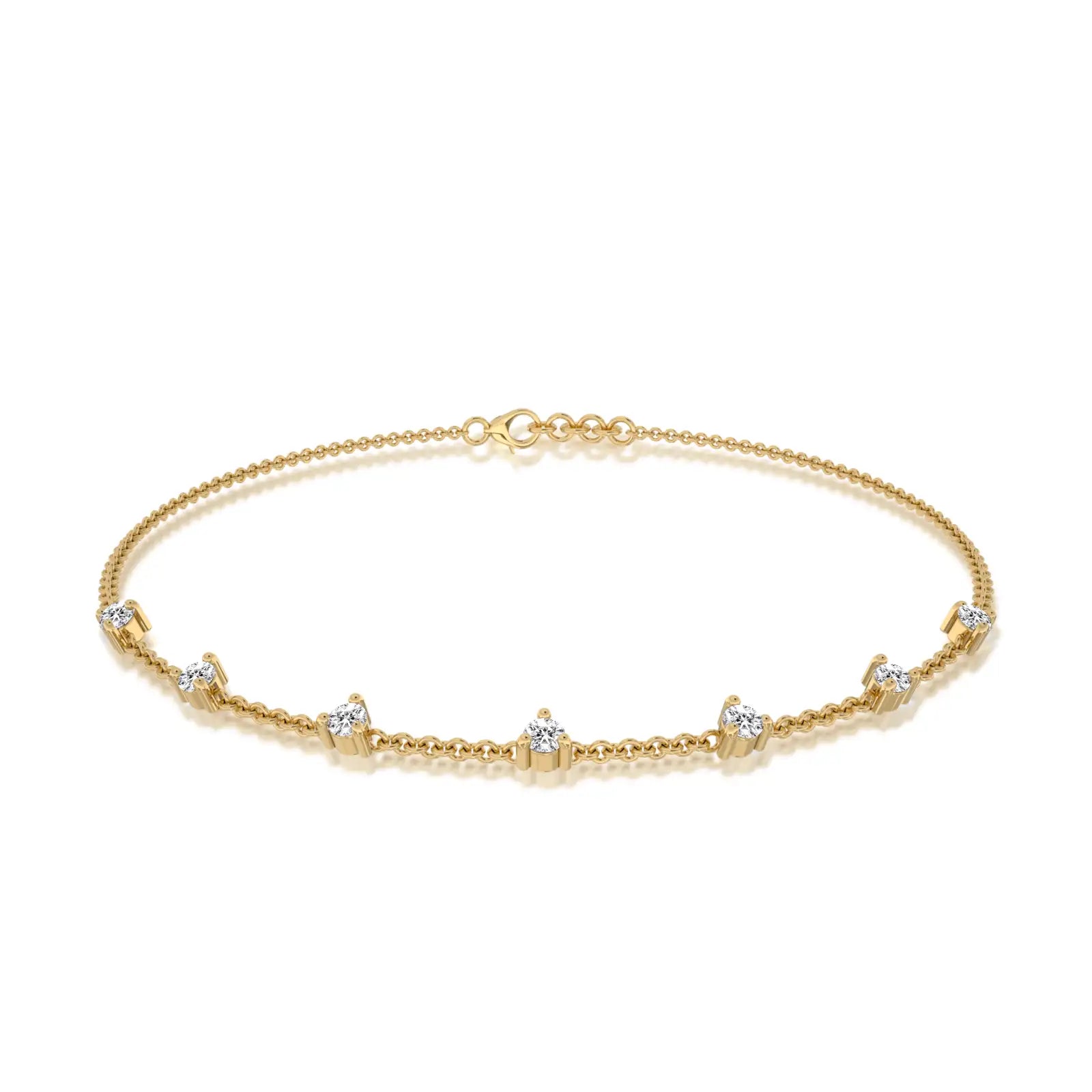 Yellow gold prong set diamond station bracelet