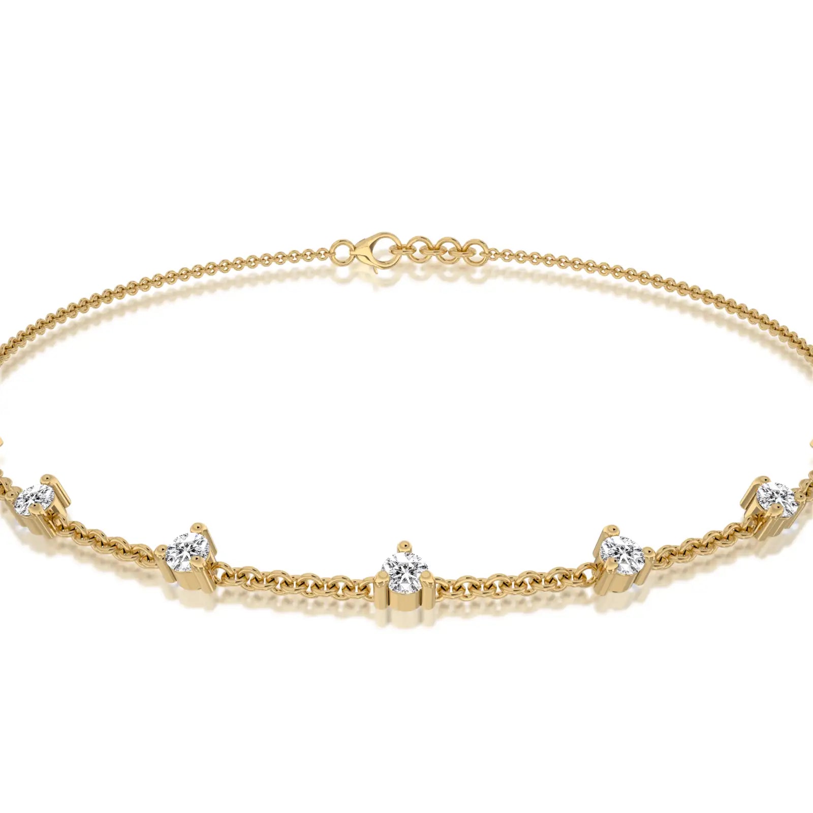 Yellow gold prong set diamond station bracelet for women