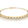 Yellow gold jing ling bezel tennis bracelet for women