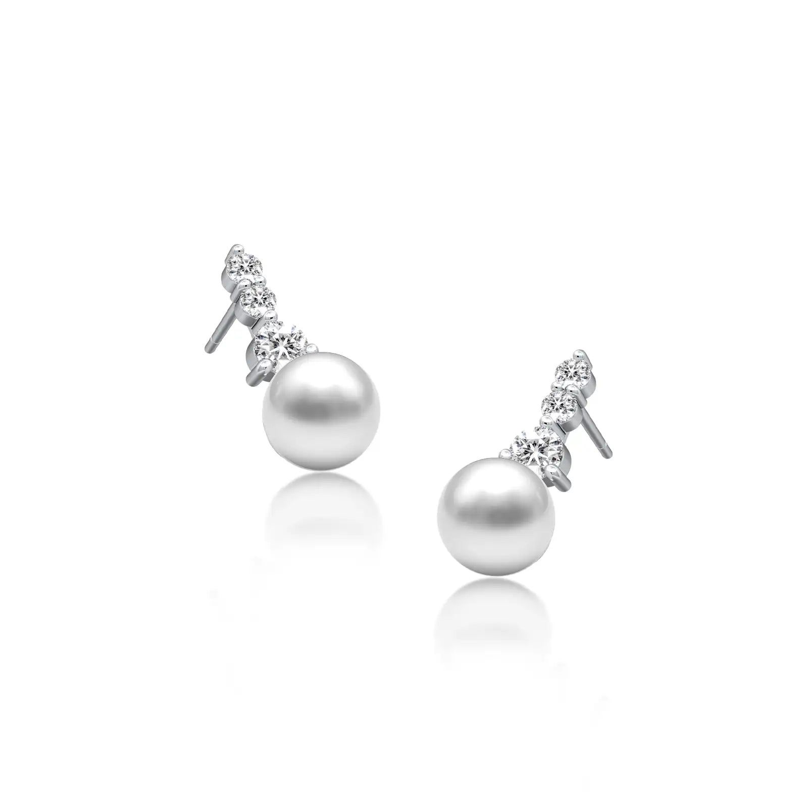 Graduated diamond trio pearl drop earrings