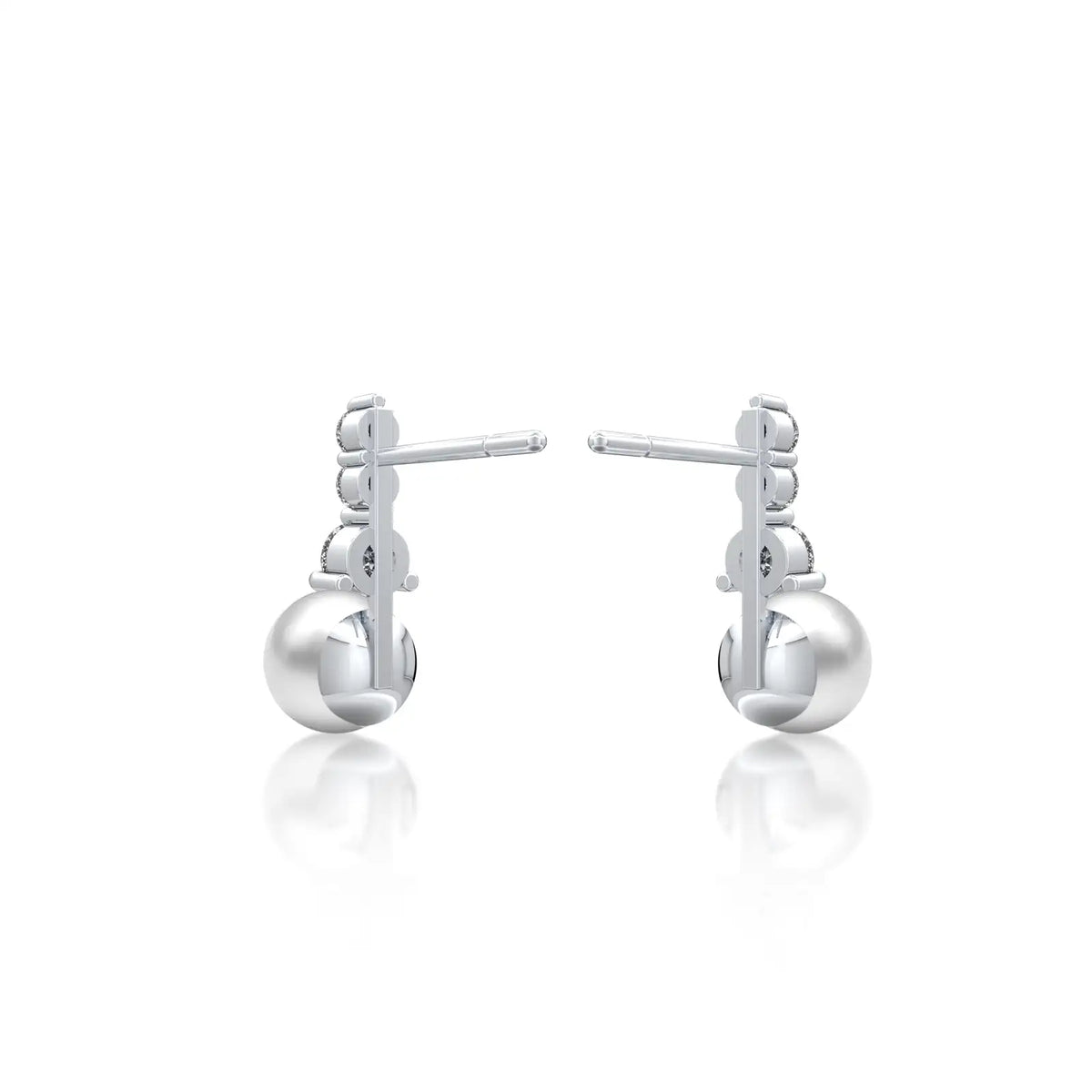 White gold graduated diamond trio pearl drop earrings