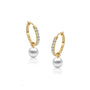 Yellow gold diamond huggie hoops with pearl drops