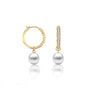 Yellow gold diamond huggie hoops with pearl drops