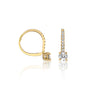 Trendy yellow gold diamond hoops with solitaire dangles 