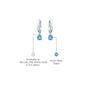 Descriptive image of White gold march birthdstone hoops with swiss blue topaz drops 