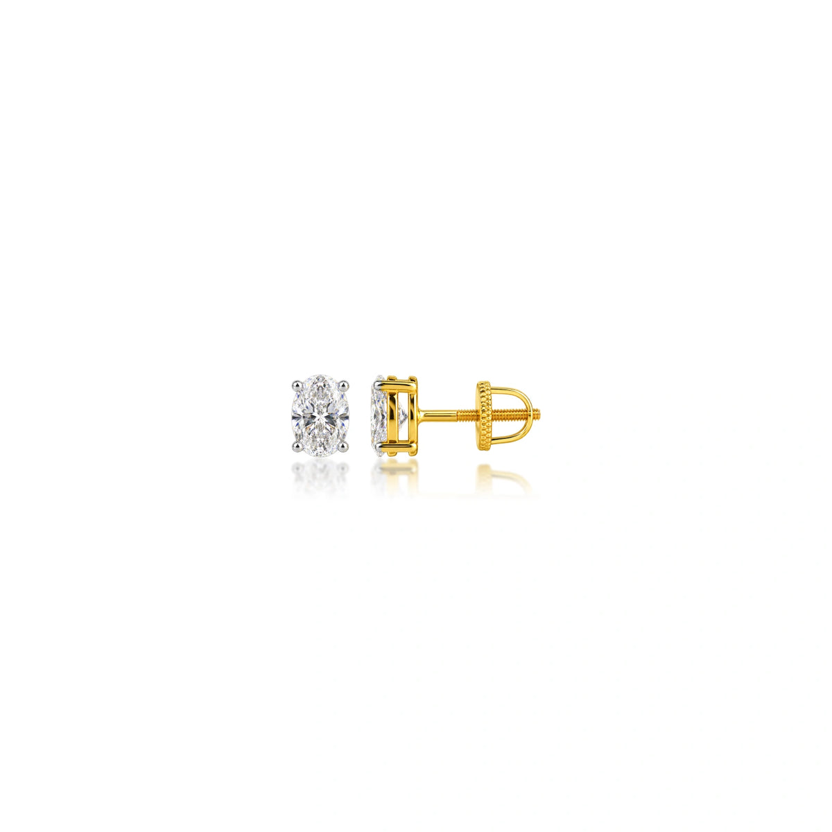 Elegant woman wearing 1.5 Ct Oval Cut Lab Grown Diamond Solitaire Earrings