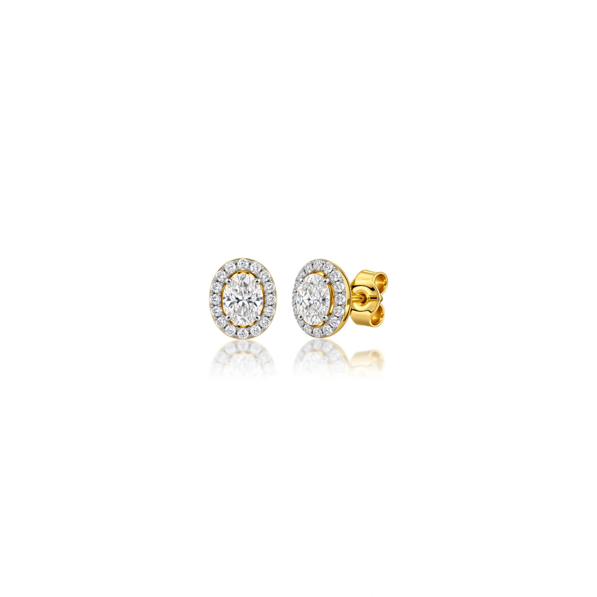 Woman wearing 1.5 Ct Oval Cut Lab Grown Diamond Halo Stud Earrings