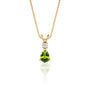 Simply stuning august birthstone pear-shaped peridot and diamond pendant
