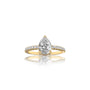 The elegant pear-shaped setting of the Xi 禧 ring makes it a charming choice for daily wear.