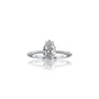 This straight-on shot of the Lian 涟 ring reveals a flawless pear-cut diamond at its center.
