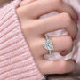 Model Wearing a Luxurious 5 Ct Heart Cut Diamond Pavé Ring for Special Occasions
