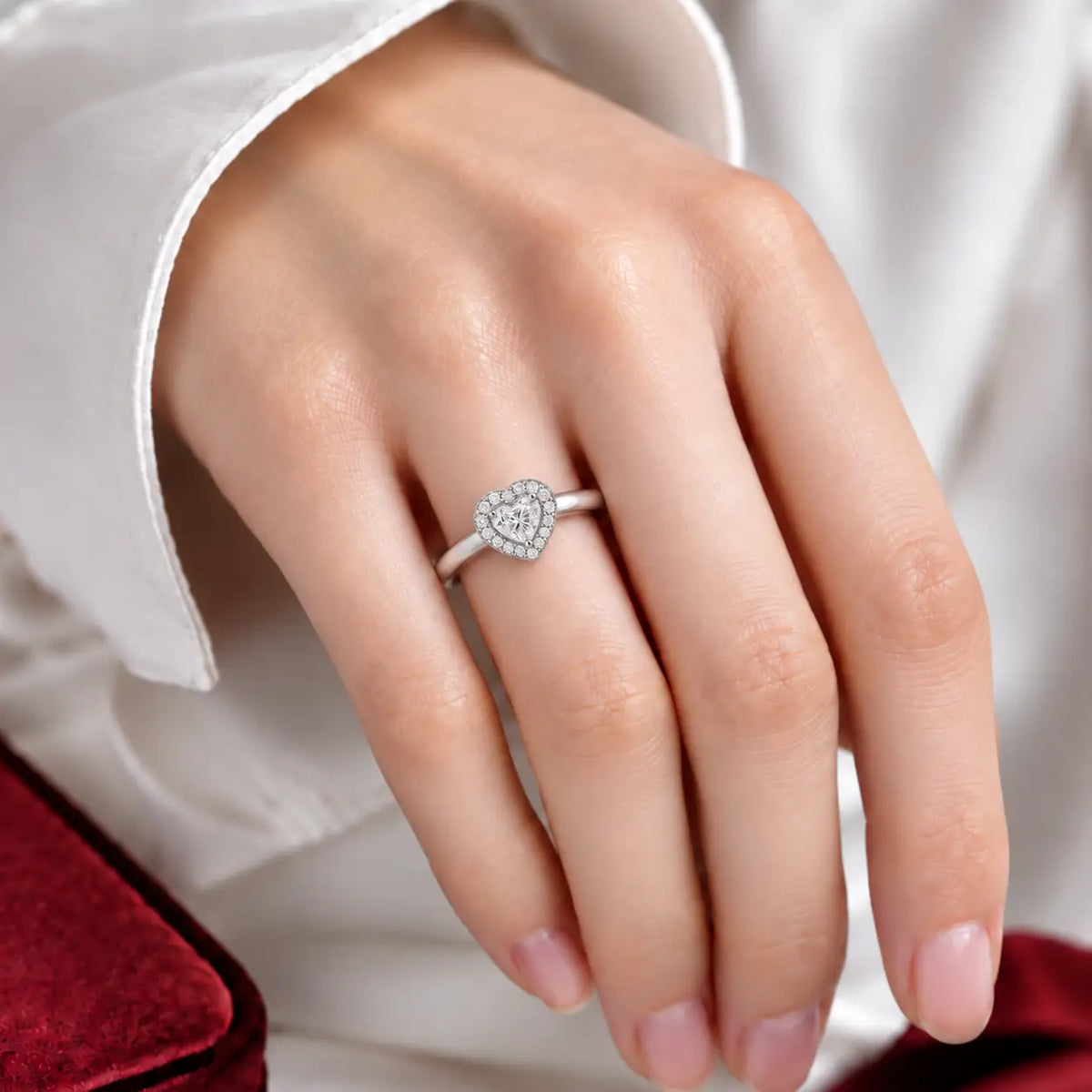 Model Wearing a Sparkling 1 Ct Heart Cut Diamond Halo Ring