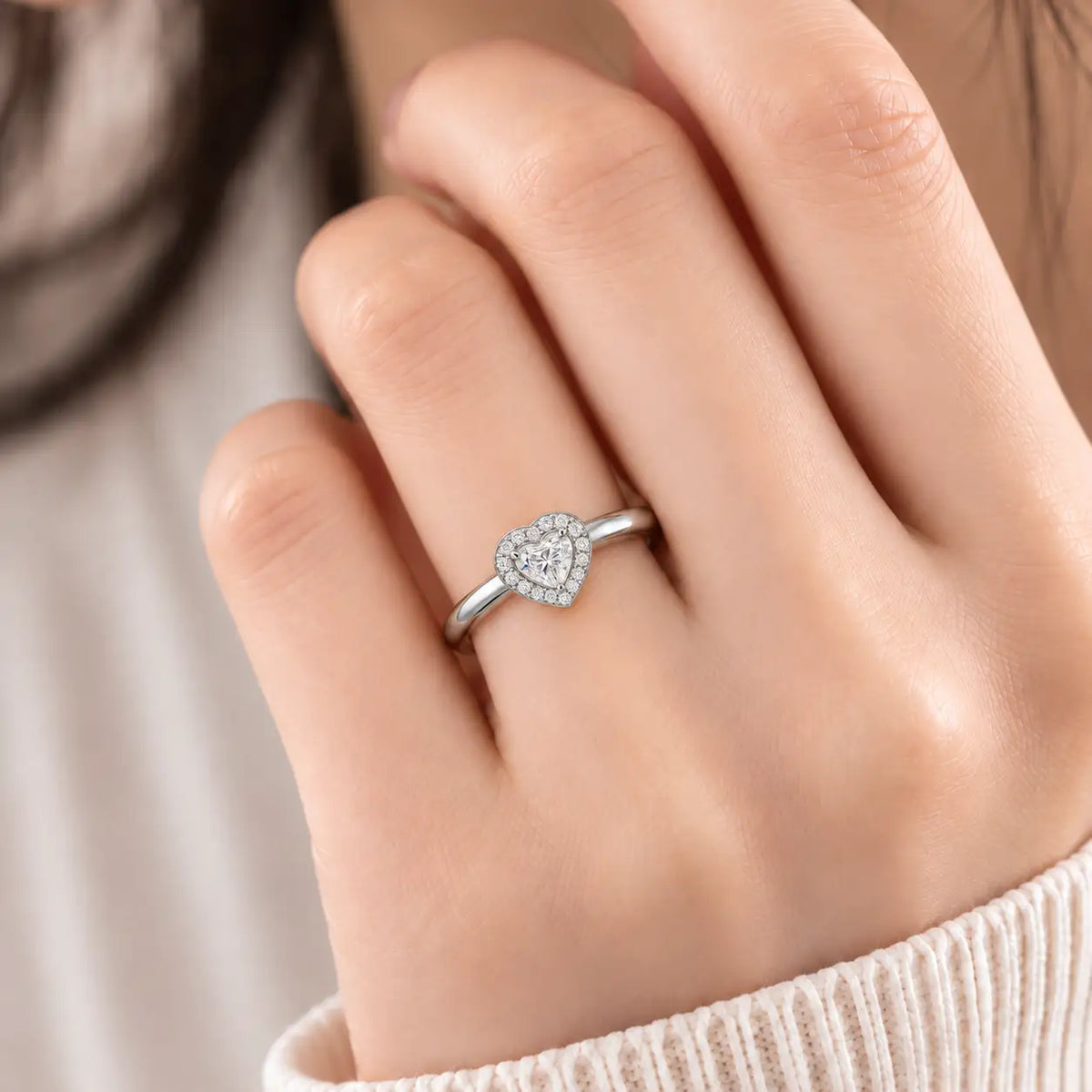 Model Wearing a Luxury 1 Ct Heart Cut Diamond Halo Ring