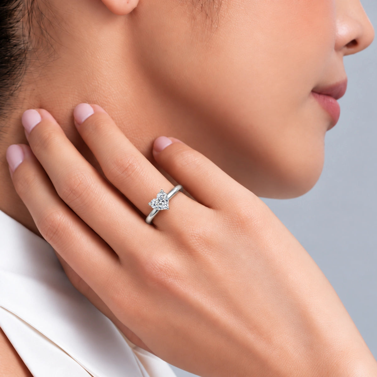 Model Wearing a Stunning Heart Shaped Solitaire Ring