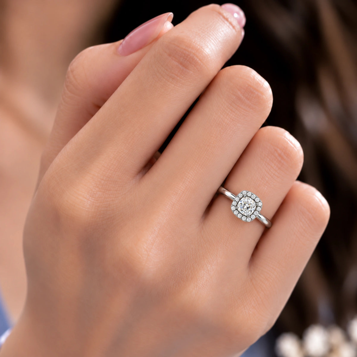Model Wearing a Beautiful 1 Ct Cushion Cut Diamond Halo Ring