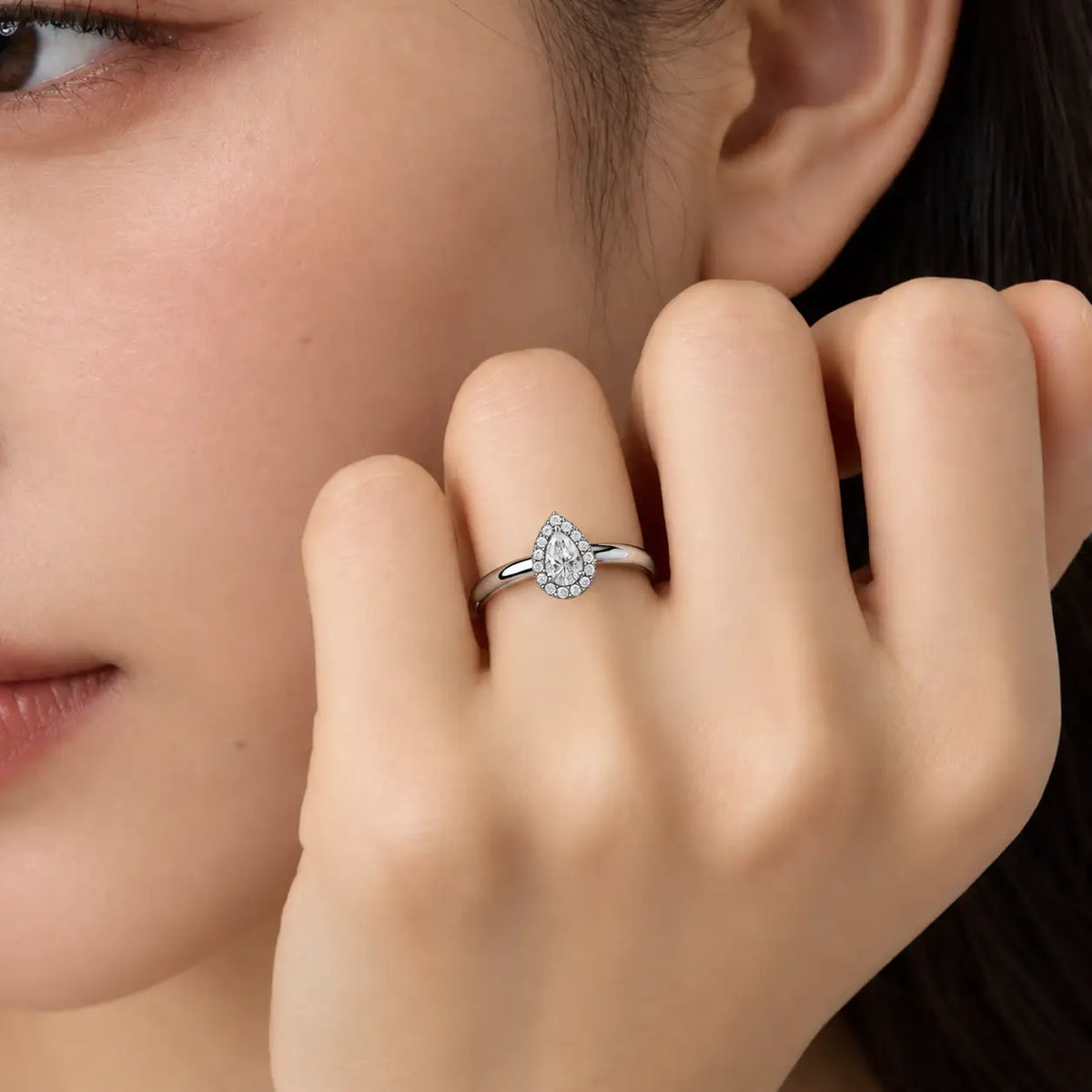 0.75 Ct Pear Cut Diamond Halo Ring
