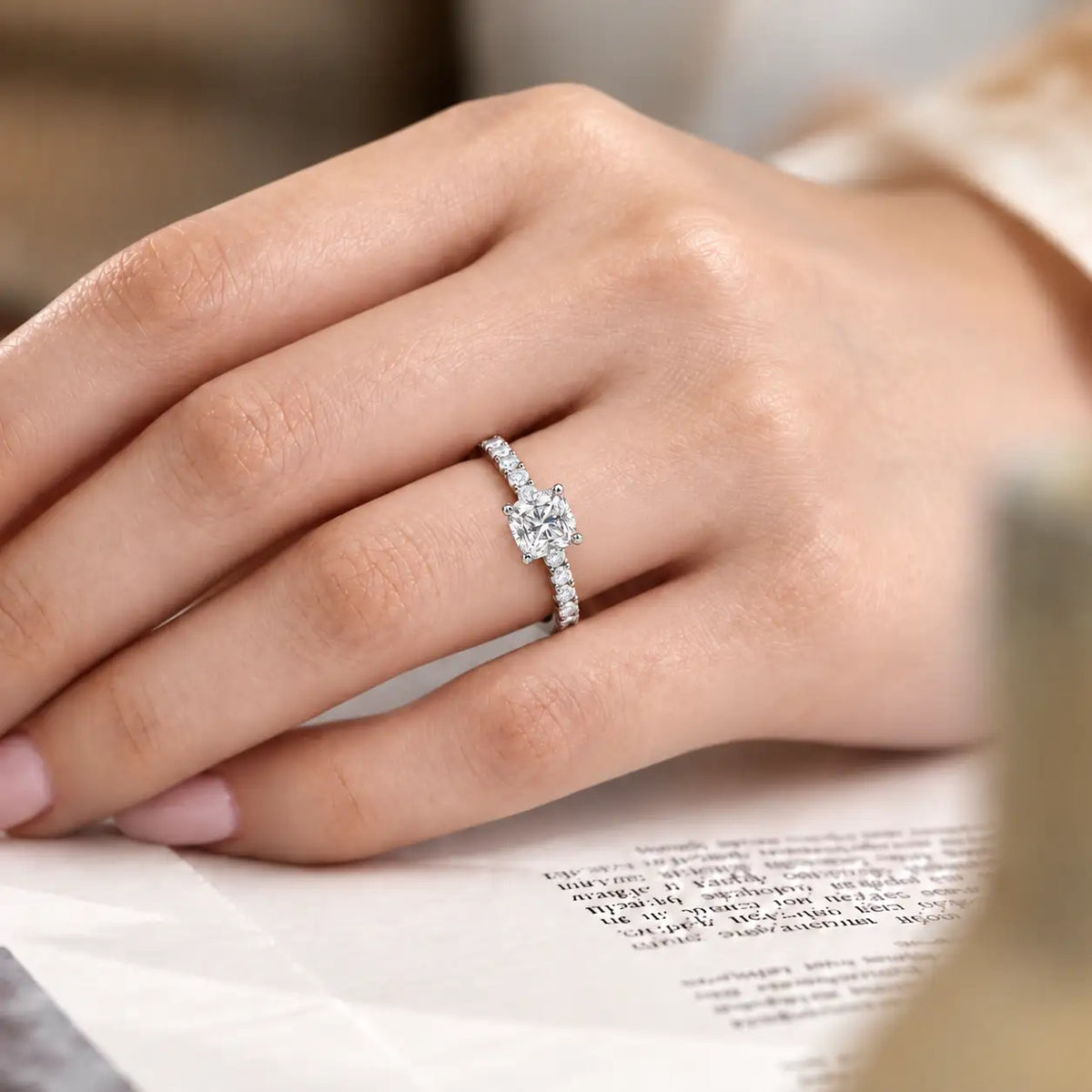 Model Wearing an Elegant Cushion Cut Diamond Pavé Ring